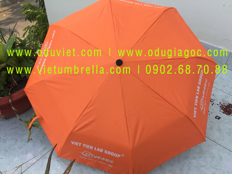xưởng sản xuất ô dù cầm tay in logo quảng cáo